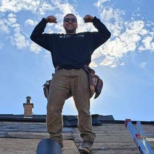 Alex Jahn in a carpenter's toolbelt — founder of Agent Logic, Fond du Lac, Wisconsin
